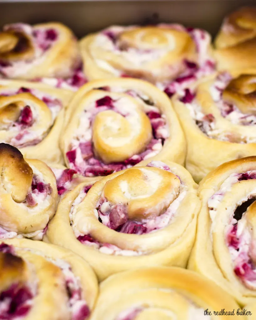 With summer on the way, give your sweet rolls a seasonal twist: fill them with fresh strawberries and sweetened cream cheese, then top with a sweet-tart lemon-flavored simple icing. #BrunchWeek TheRedheadBaker.com