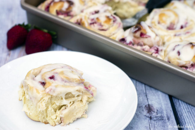 With summer on the way, give your sweet rolls a seasonal twist: fill them with fresh strawberries and sweetened cream cheese, then top with a sweet-tart lemon-flavored simple icing. #BrunchWeek TheRedheadBaker.com