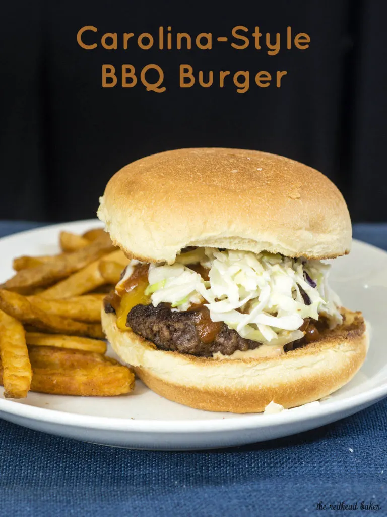 Carolina-style BBQ burgers are juicy beef patties topped with sharp cheddar cheese, tangy mustard- and vinegar-based BBQ sauce and coleslaw. #SundaySupper TheRedheadBaker.com