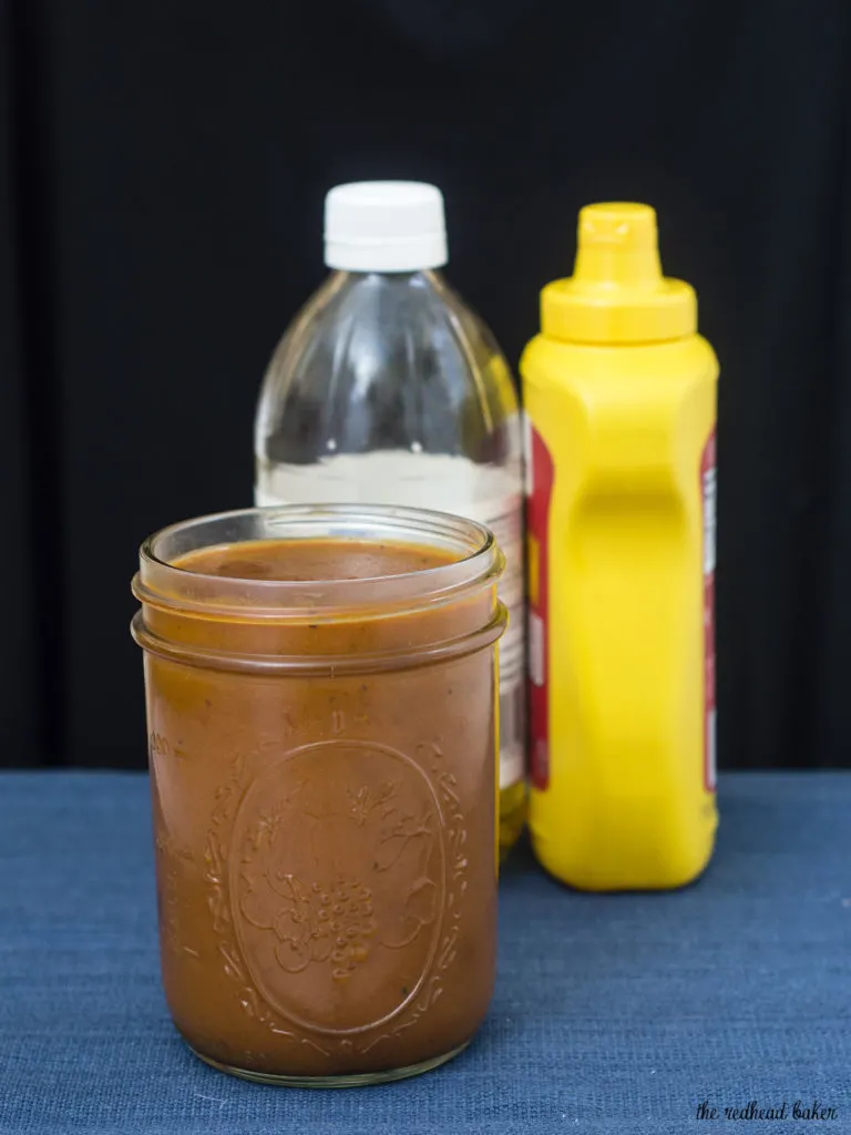 Carolina-style barbecue sauce has a base of mustard and vinegar with just a bit of tomato sauce, unlike other regional barbecue sauces. It's spicy and tangy and delicious on everything! TheRedheadBaker.com