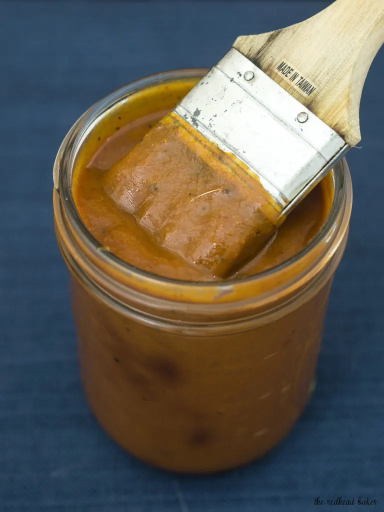 Carolina-style barbecue sauce has a base of mustard and vinegar with just a bit of tomato sauce, unlike other regional barbecue sauces. It's spicy and tangy and delicious on everything! TheRedheadBaker.com