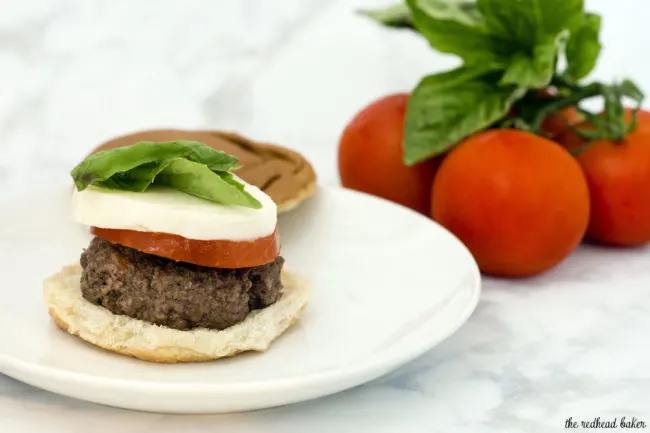 Caprese burgers are topped with the classic flavors of caprese &mdash; tomato, basil, mozzarella, and a balsamic reduction sauce. #SundaySupper