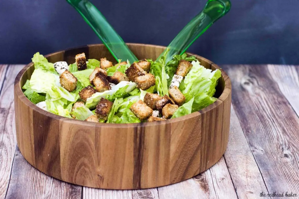 Lighter Caesar salad is delicious, and light on the calories. This version replaces most of the oil and the egg yolks in the dressing with fat-free Greek yogurt, making it creamy, but healthier.