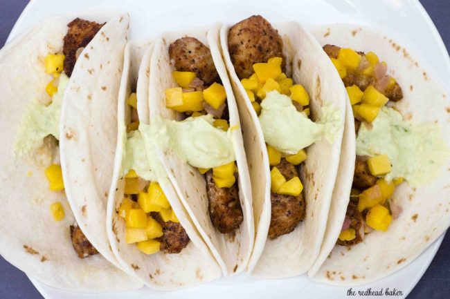 Mahi mahi tacos with mango salsa and avocado crema are a delicious, easy weeknight meal with lots of spice and summer flavor.