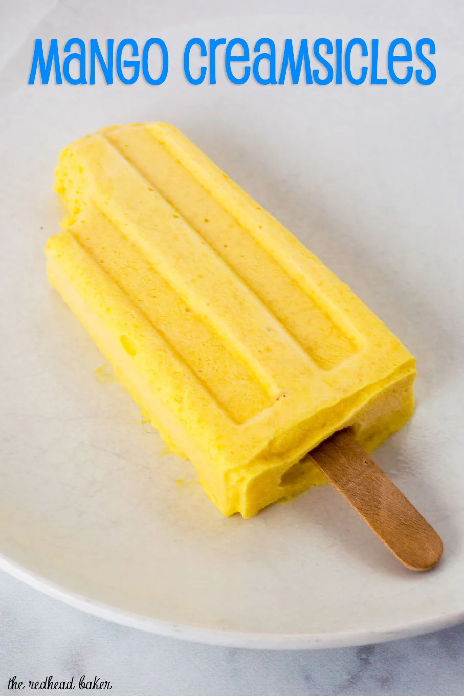 Mango creamsicles have only three ingredients, and are so easy to make! They're my son's favorite treat on a hot summer day. #SundaySupper