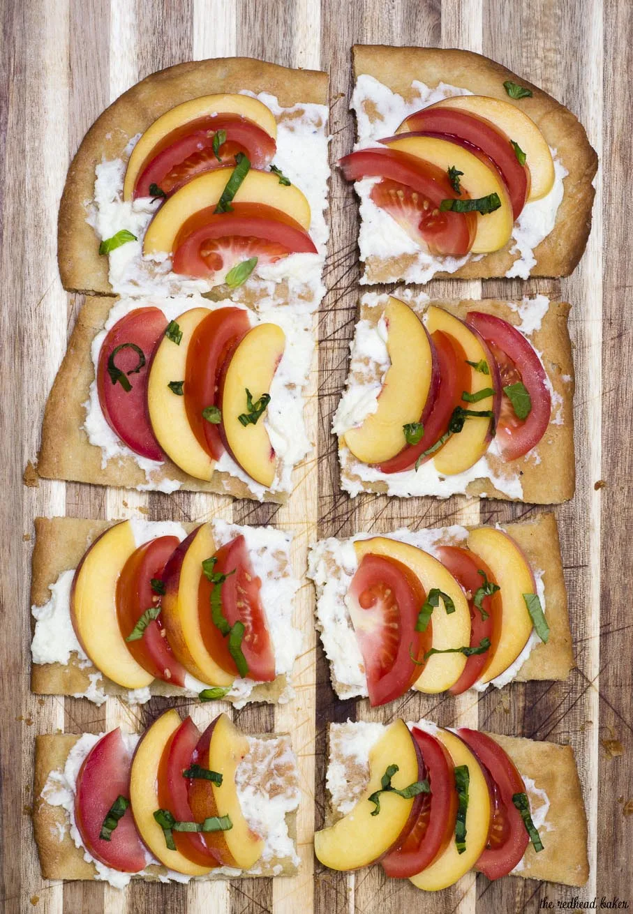 Tomato-peach flatbread is the perfect summer appetizer. You can't beat fresh summer tomatoes and peaches, plus no cooking required! #CLBlogger Recipe at TheRedheadBaker.com