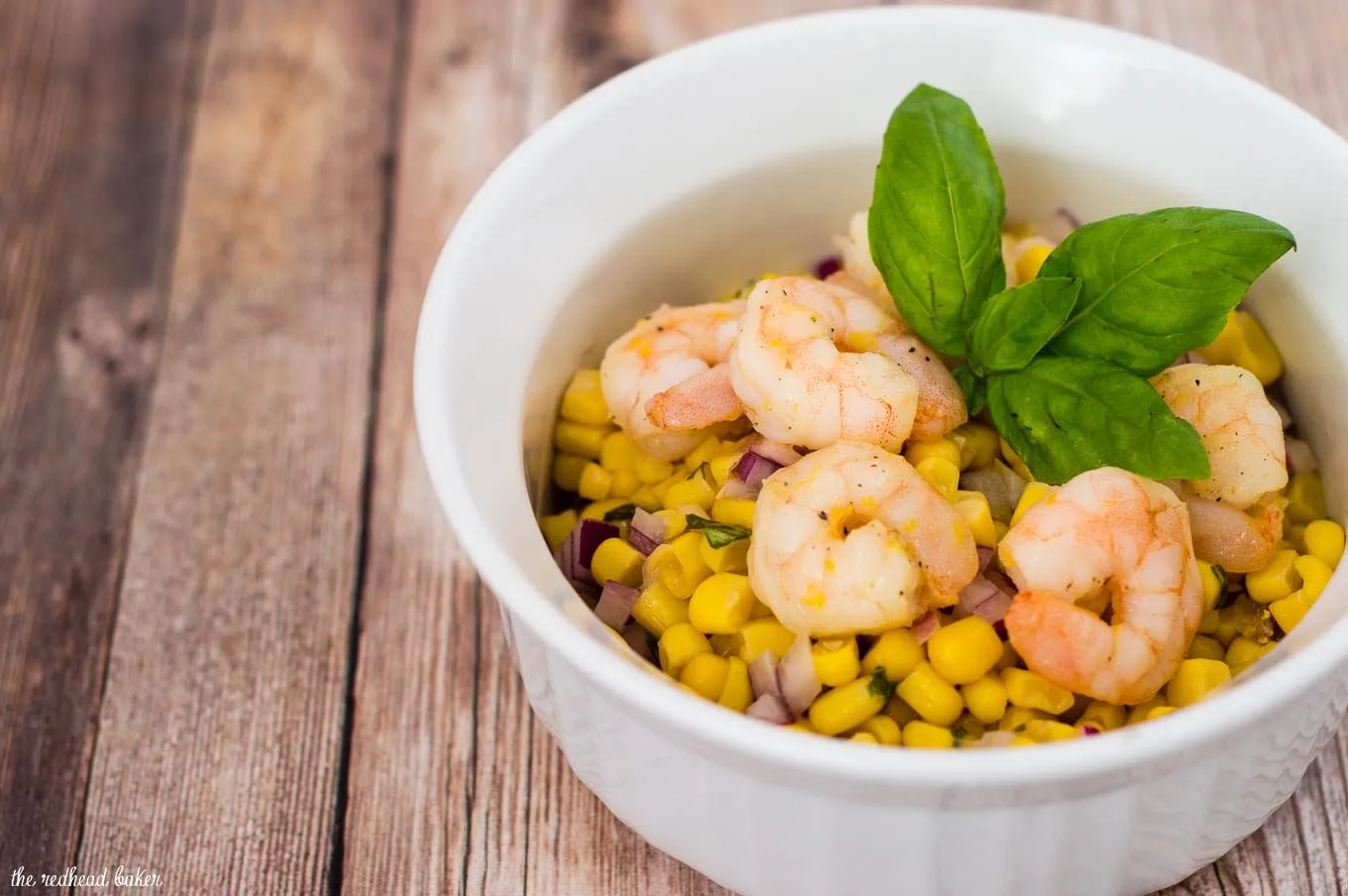 Can dinner be both easy AND healthy? Yes! Serve lemon shrimp over a salad of corn, red onion and basil with a red wine vinaigrette.