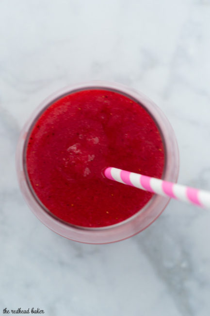 Strawberry sangria slushies are fun frozen cocktail — white wine blends with frozen strawberries and triple sec for a delicious summer treat!