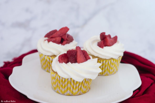 Strawberry shortcake cupcakes are an easy dessert that kids and adults alike will enjoy. Vanilla cupcakes are topped with whipped cream and strawberries.
