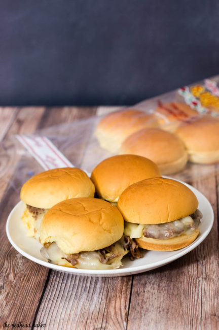 Snack on these easy Philly cheesesteak sliders, loaded with beef, fried onions, and provolone cheese at your next football party! #SundaySupper