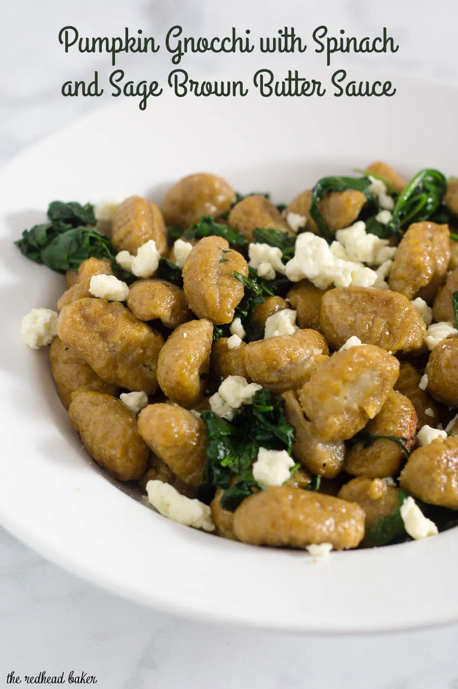 Pumpkin gnocchi and spinach with sage brown butter sauce is a hearty vegetarian meal full of flavor. You won't miss the meat! #SundaySupper