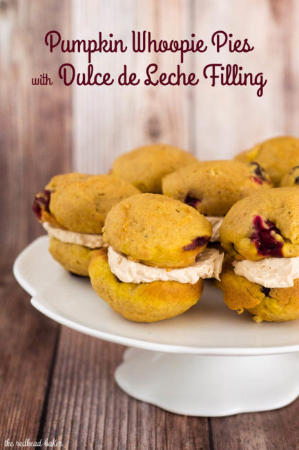 Two soft, light pumpkin cookies studded with fresh cranberries are sandwiched with creamy dulce de leche marshmallow filling.