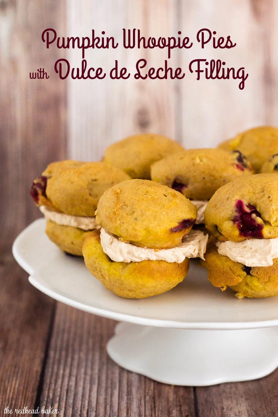 Pumpking Whoopie Pies sandwich two soft, light pumpkin cookies studded with fresh cranberries with creamy dulce de leche marshmallow filling.