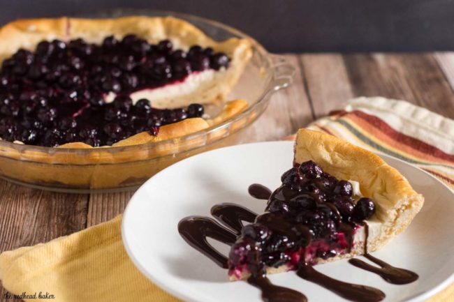 Pizza for dessert? You bet! Cheesecake Pizza has crescent dough as the crust, topped with sweetened cream cheese, berry compote and chocolate sauce. #SundaySupper