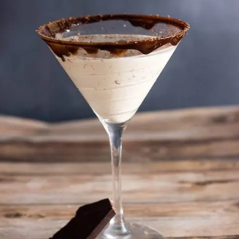 Chocoholics will love this chocolate martini, with chocolate liqueur and creme de cacao, and a double-chocolate coated martini glass rim. #Choctoberfest