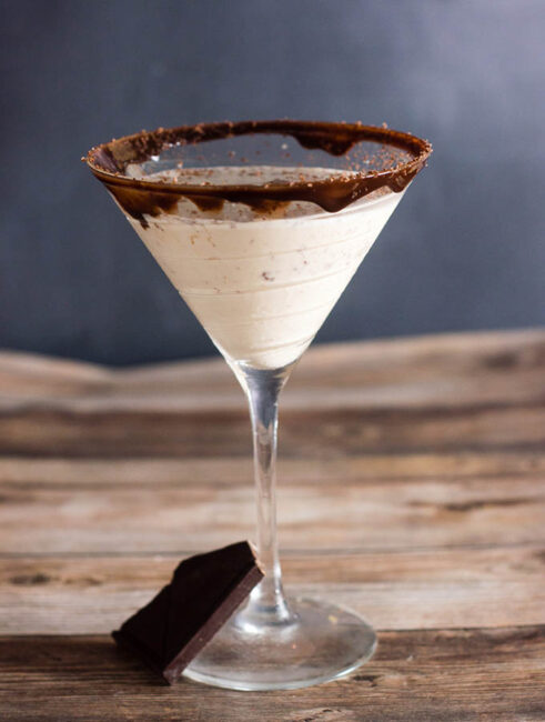 Chocoholics will love this chocolate martini, with chocolate liqueur and creme de cacao, and a double-chocolate coated martini glass rim. #Choctoberfest