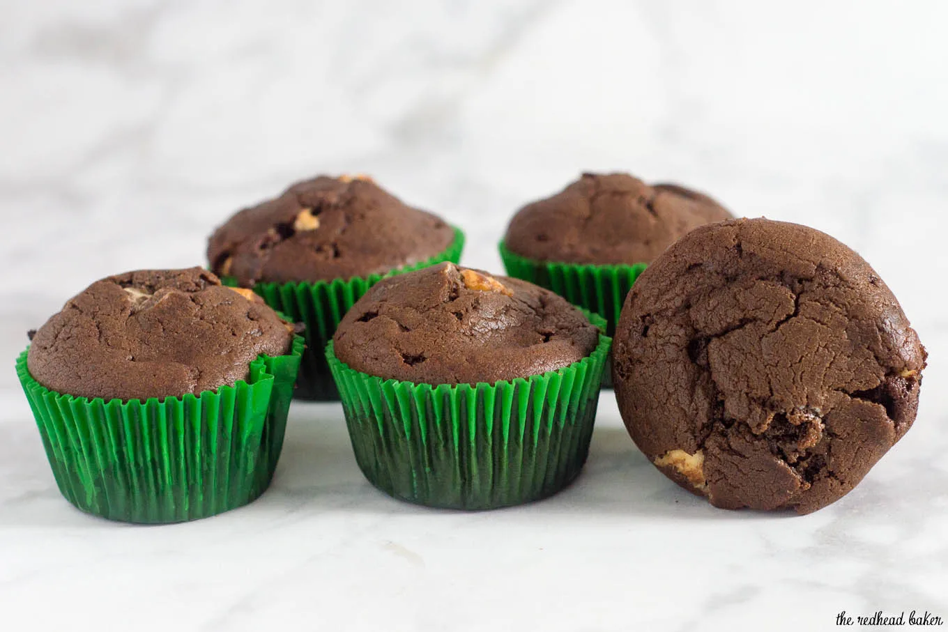 Double chocolate muffins pack a double punch -- rich semisweet chocolate in the muffin batter, and white chocolate chips mixed in. Are they for breakfast or dessert? You decide! #Choctoberfest