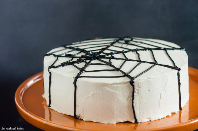 Scare up some fun with this spooky Halloween Spiderweb Cake. It involves basic piping techniques, so it's easy enough for beginner cake decorators!