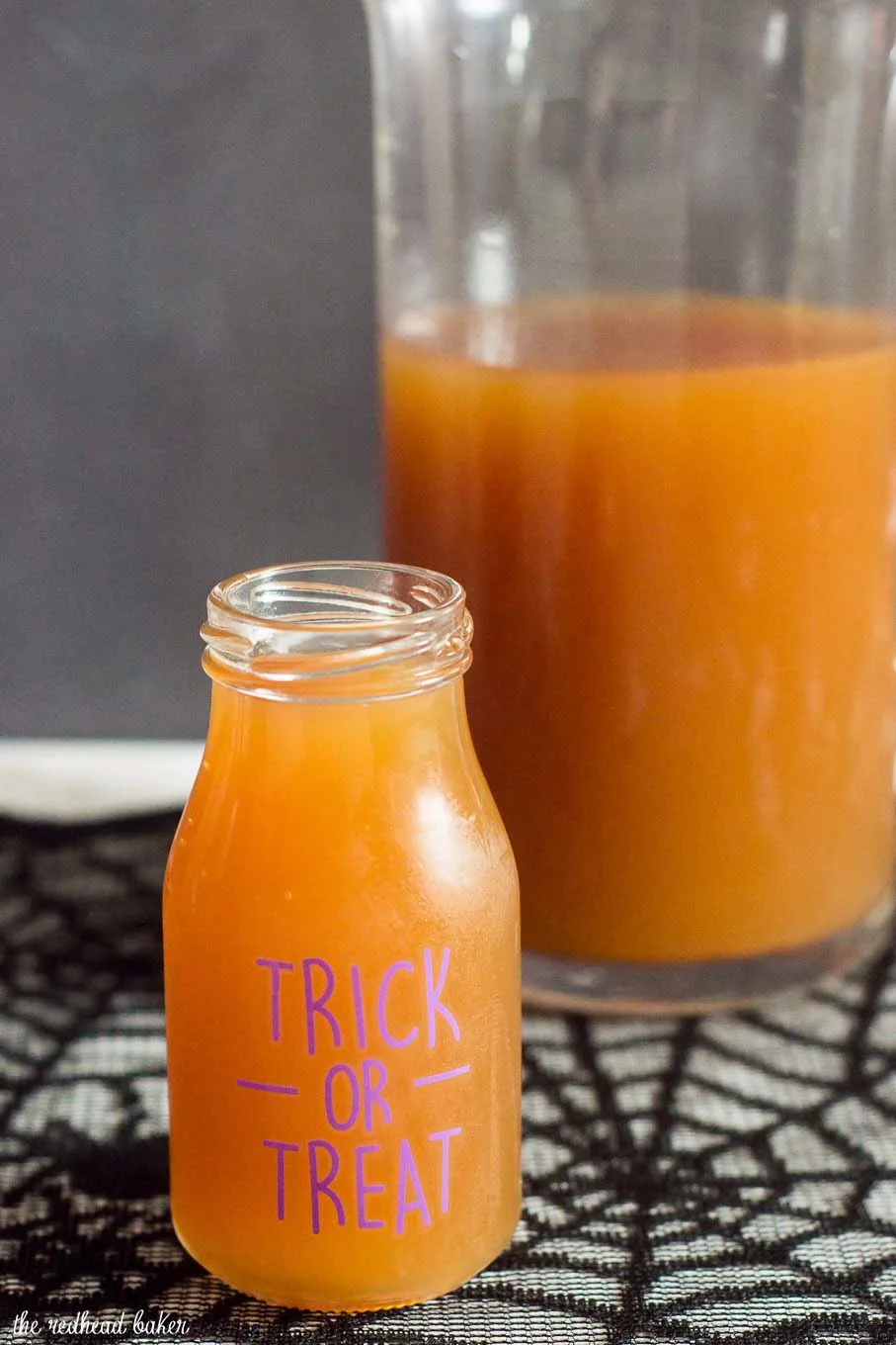 Serve a spooky witch's brew at your Halloween party — a Poison Apple Cider Cocktail, with rum and cinnamon-infused brandy! 