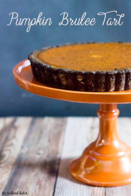 Move over, classic pumpkin pie! Pumpkin brulee tart has a custard-like spiced pumpkin filling baked in a chocolate cookie tart shell, then is sprinkled with sugar and bruleed. #PumpkinWeek