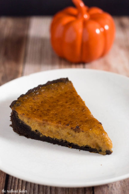 Move over, classic pumpkin pie! Pumpkin brulee tart has a custard-like spiced pumpkin filling baked in a chocolate cookie tart shell, then is sprinkled with sugar and bruleed. #PumpkinWeek