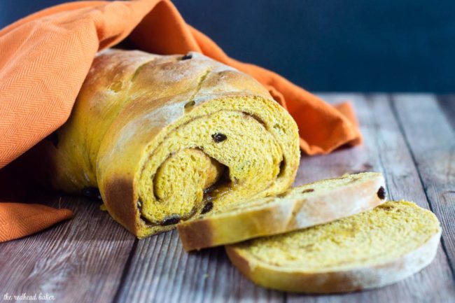 Comfort food with a fall twist — pumpkin cinnamon raisin bread is studded with raisins with a swirl of cinnamon, butter and brown sugar. #PumpkinWeek