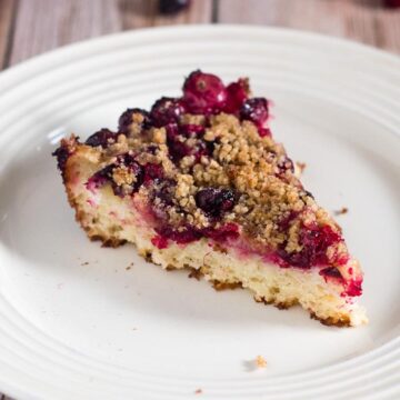 Cranberry crumb cake combines an orange-flavored cake, sugared cranberries and crumb topping for a delicious holiday breakfast or dessert.