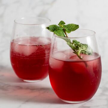 Pomegranate green tea mojitos are a Moroccan twist on a Cuban cocktail. The classic mint-and-lime drink gets an extra flavor twist from pomegranate and green tea.