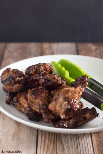 These spicy-sweet chicken wings are coated in a glaze of Smucker's Fruit & Honey Blueberry Lemon Fruit Spread, shallot, vinegar and chipotle chili powder. #EasyHolidayEats #ad