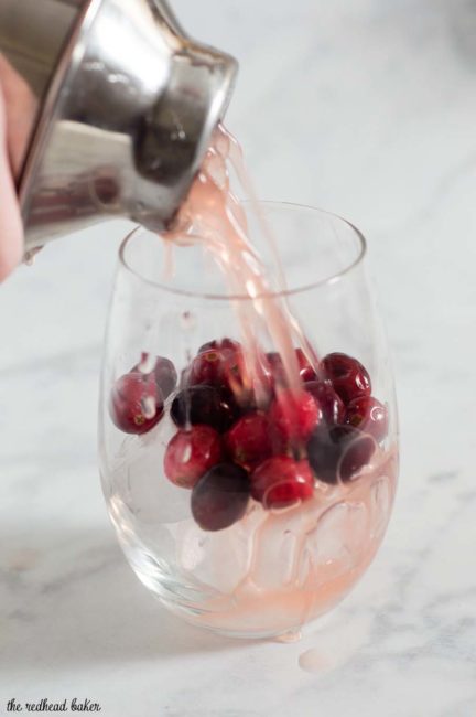 Cranberry cinnamon whiskey sour is an easy, festive cocktail for the Christmas season. Shake up a batch for your holiday party!