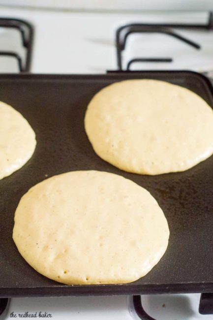 Eggnog pancakes are light and fluffy with the subtle flavor of the traditional Christmas drink, drizzled with nutmeg-infused maple syrup.