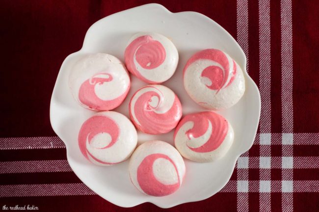 Beautiful swirled peppermint meringue cookies are a festive addition to your holiday party dessert tray! Bonus: they're naturally fat-free! #SundaySupper