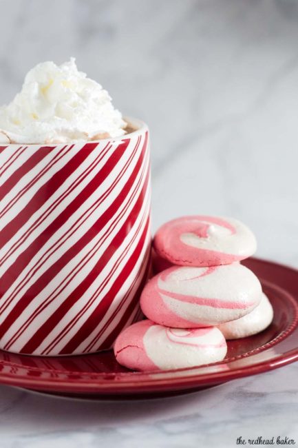 Beautiful swirled peppermint meringue cookies are a festive addition to your holiday party dessert tray! Bonus: they're naturally fat-free! #SundaySupper