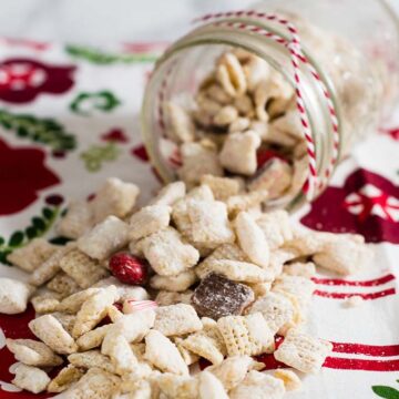 When you leave out Santa's cookies and milk, don't forget the reindeer chow! This snack mixes white chocolate muddy buddies with peppermint treats.