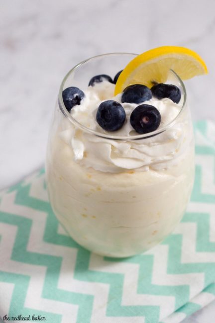 Meyer lemon mousse topped with fresh berries combines the curd of tangy-sweet meyer lemons with whipped cream for a flavorful, light dessert. #ProgressiveEats