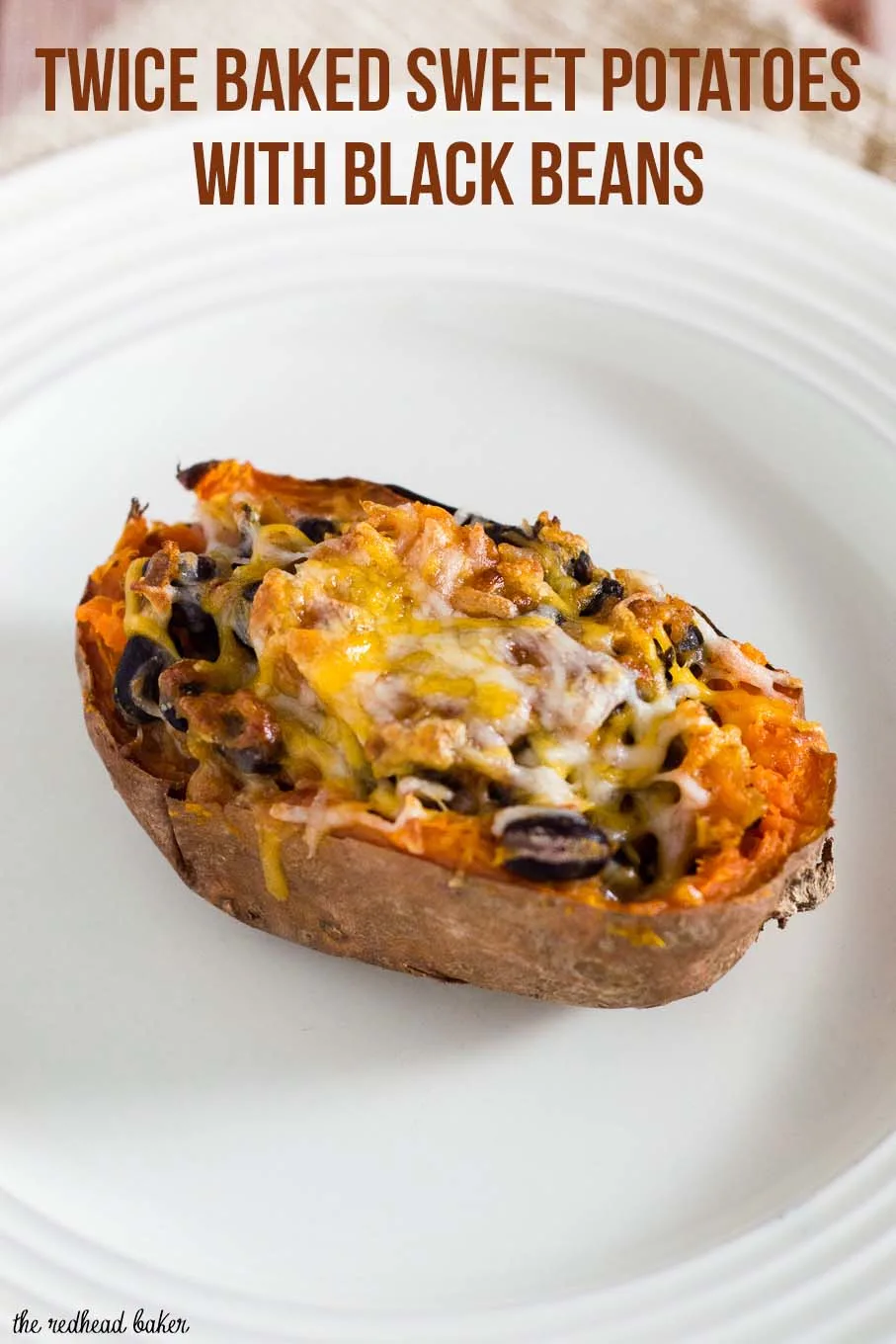 Twice-baked sweet potatoes are stuffed with a mixture of mashed sweet potatoes, black beans, onion, garlic and spices, and topped with melty Borden® Cheese for a healthier vegetarian dinner. #BordenCheeseLove #Ad