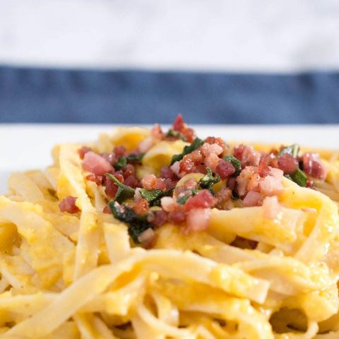 Not a true pasta carbonara, this dish uses pureed butternut squash instead of egg to thicken the sauce that coats the fettuccine.