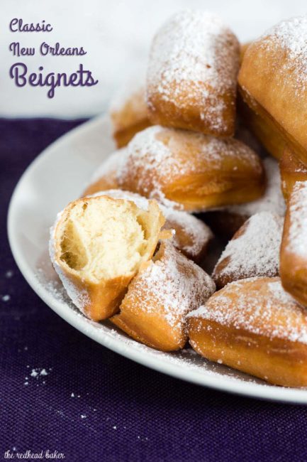 Mardi Gras means it's time for beignets! This is a classic New Orleans recipe, deep-fried then coated in powdered sugar, and served with raspberry jam.