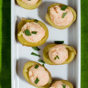 Celebrate St. Patrick's Day with smoked salmon stuffed potatoes. These appetizers are little pots of gold stuffed with delicious filling! #ProgressiveEats