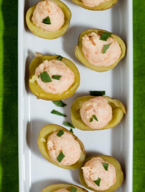 Celebrate St. Patrick's Day with smoked salmon stuffed potatoes. These appetizers are little pots of gold stuffed with delicious filling! #ProgressiveEats