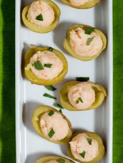 Celebrate St. Patrick's Day with smoked salmon stuffed potatoes. These appetizers are little pots of gold stuffed with delicious filling! #ProgressiveEats