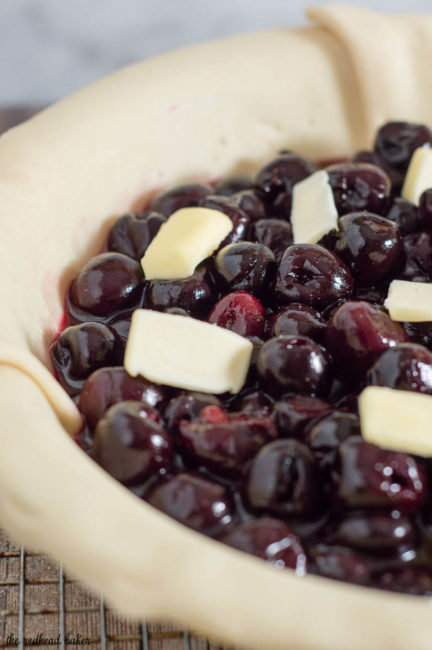 We're celebrating Pi{e} Day! Drunken cherry vanilla pie combines cherries, vanilla bean, and brandy in a flaky pie crust.