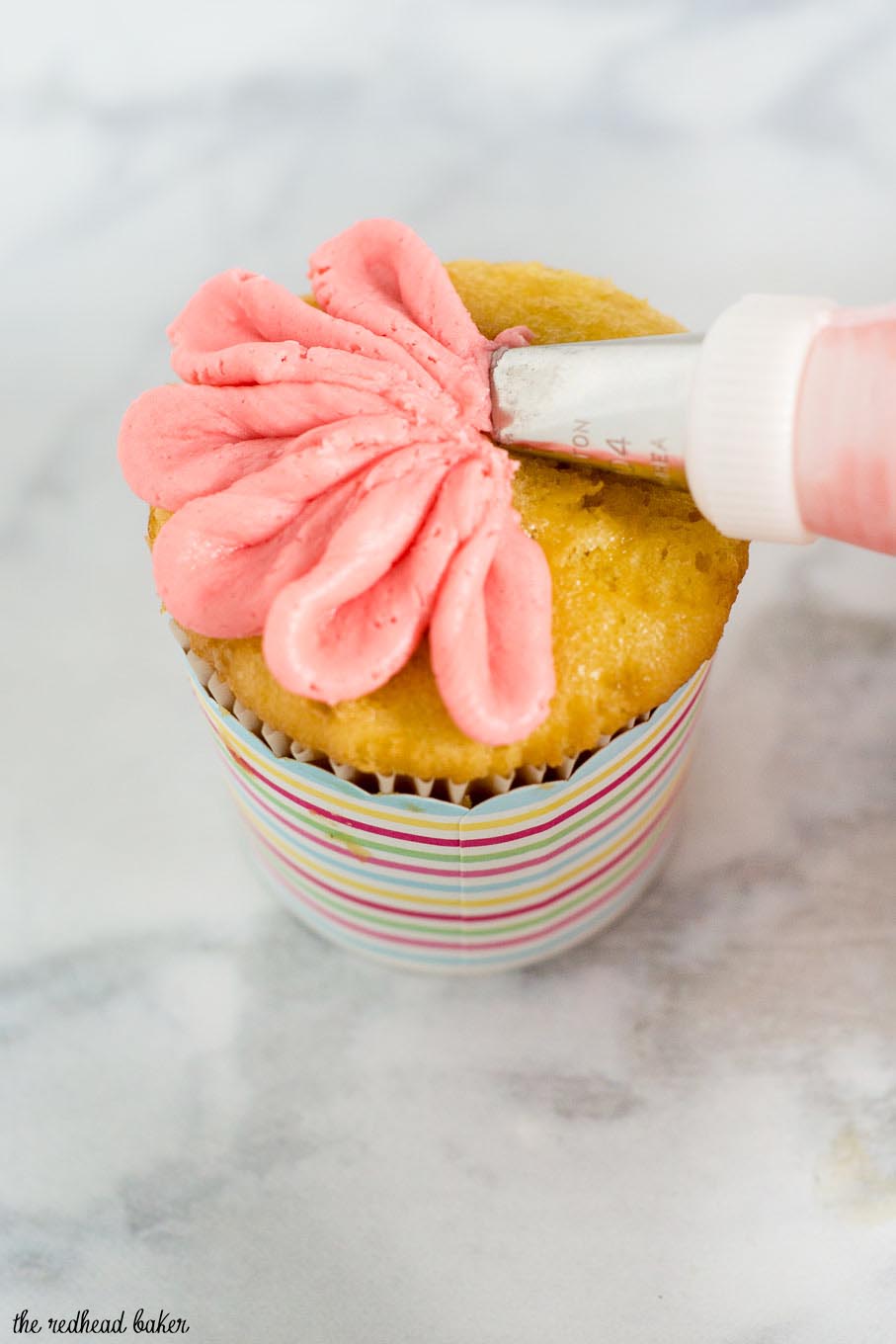 With buttercream icing and a few simple tools, use this tutorial to turn your favorite cupcakes into beautiful gerbera daisy cupcakes for any spring occasion!