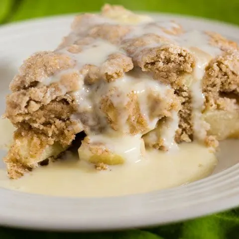 Irish apple cake has a scone-like texture and is studded with chopped apples. Serve with vanilla sauce for a delicious dessert.