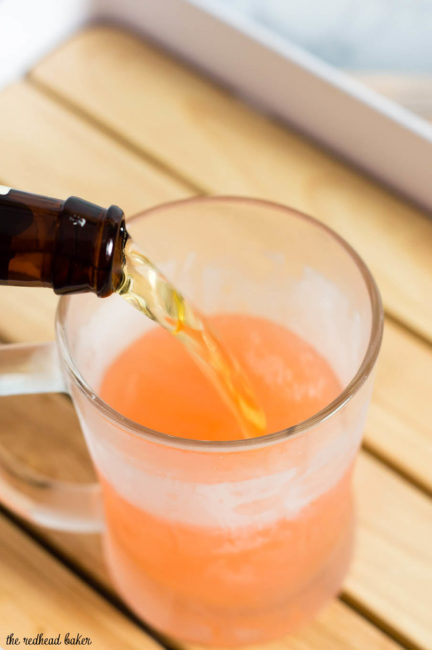 Make a pink lemonade shandy, a beer-based cocktail that blends wheat beer with strawberry- or raspberry-flavored lemonade, for your next spring party.