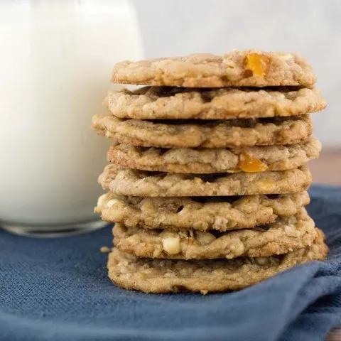 White chocolate apricot oatmeal cookies are crisp at the edges and tender in the middle, and loaded with delicious white chocolate chips and dried apricot pieces.