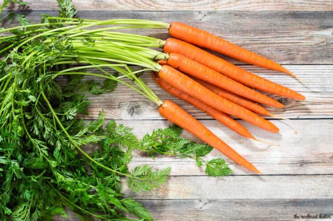 Butter-braised spring carrots are a simple yet flavorful side dish. A garnish of fresh basil complements the sweeter carrots perfectly.