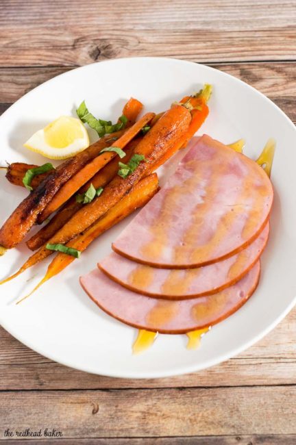 Butter-braised spring carrots are a simple yet flavorful side dish. A garnish of fresh basil complements the sweeter carrots perfectly.