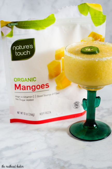 Get a Taste of Adventure with a frozen mango jalapeno margarita! Blend Nature’s Touch organic mango with jalapeno-infused tequila, triple sec and lime juice. #FlavorAdventure #ad