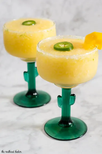 Get a Taste of Adventure with a frozen mango jalapeno margarita! Blend Nature&rsquo;s Touch organic mango with jalapeno-infused tequila, triple sec and lime juice. #FlavorAdventure #ad